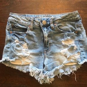 Hi-rise shorty jean shorts with distressing